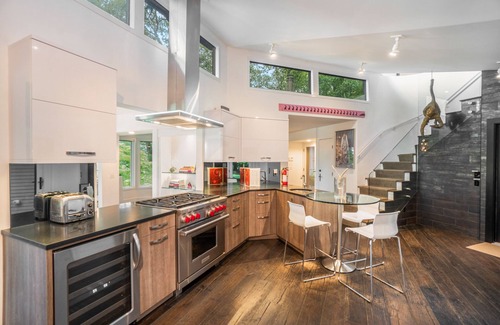 Saugatuck Casa | Stylish riverfront retreat w/ hot tub, screened boathouse, fishing dock & kayaks