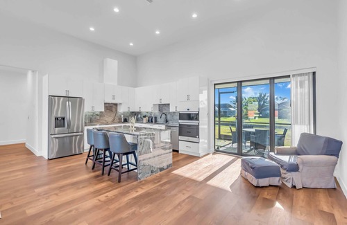Long Meadow Villa | Stylish salt water pool home is ideal for a respectable holiday