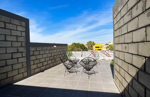Centro de Guadalajara Apartamento | Stylish urban loft with access to gym and work rooms.