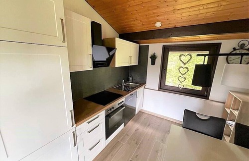 Feriendorf Hennesee Casa | Stylish vacation home with covered terrace.