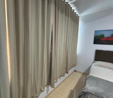 Goiania Apartamento | Suíte 103 confortável e espaçosa