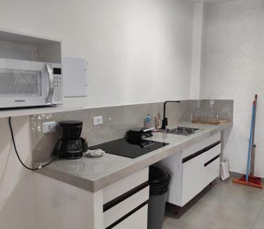 Praia de Leste Casa | Suíte 25 família Praia de Leste