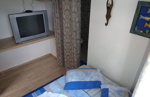 Bairro da Enseada Cama Y Desayuno | Suíte 4 para PcD com piscina em Caraguatatuba