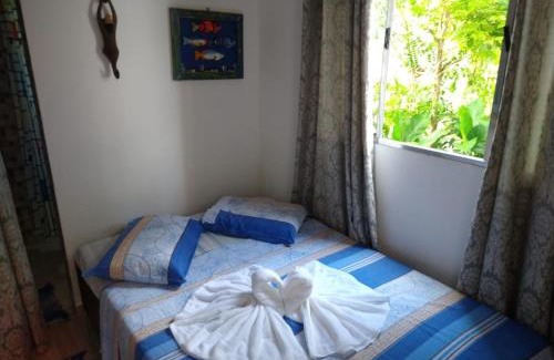 Bairro da Enseada Casa | Suíte 4 para PcD com piscina em Caraguatatuba