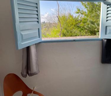 Areia Casa | Suíte Aconchego