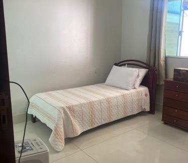 Goiania Casa | Suíte com janela para o jardim