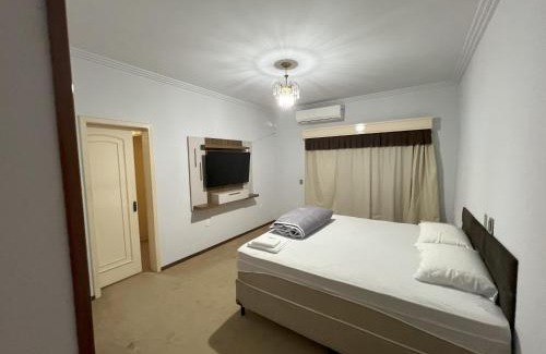 Sinop Casa | Suíte de luxo no centro com closet e hidromassagem