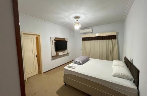 Sinop Casa | Suíte de luxo no centro com closet e hidromassagem