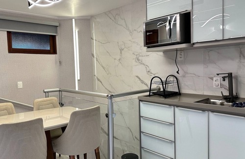 Vila Poran Apartamento | Suíte Luxo no Hotel Quatre Saisons