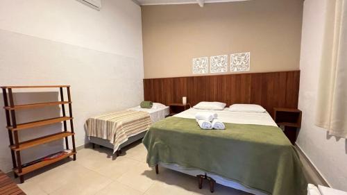 Cumuruxatiba Casa | Suítes Curió - Passarim Hospedagem