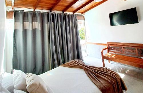 Portal das Artes Casa | Suítes Estou de Férias Paraty