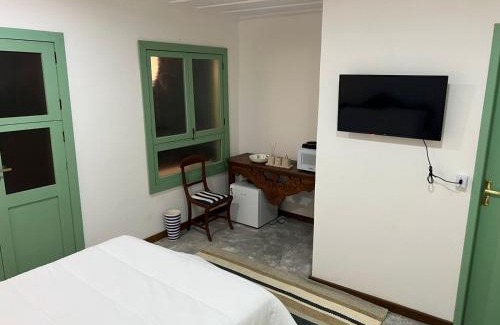 Areal Casa | Suite IPÊ ROSA