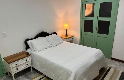 Areal Casa | Suite IPÊ ROSA