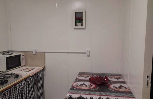 Cidade Nova Apartamento | suite+kitchen twelve with air conditioning