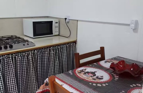 Cidade Nova Apartamento | suite+kitchen twelve with air conditioning