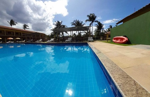 Canavieiras Apartamento | Suite on the seafront with air conditioning and crystal-clear swimming pool.