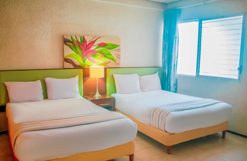 Zona Paseo Montejo Hotel | Suites del Sol