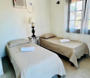 Porto Belo Casa | Suites em Condominio com Piscina 150 mt Manguinhos