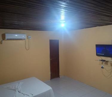Iranduba Casa | Suites para casais com area nativa