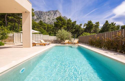 Bast Villa | Summer House Lea - Villa with heated pool and sea view