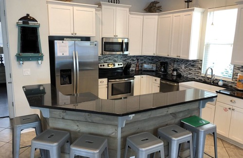 Villages of Crystal Beach Casa | Emerald Escape: 5 Kings, 4 Dbls, 6 Baths, HeatedLagoonPool FREE beach shuttle