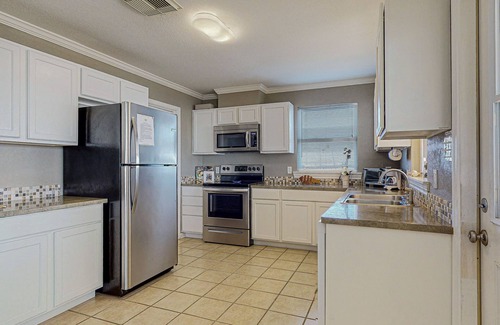 Galveston Casa | Sol y luna: esta linda y asequible casa frente al mar est�� cerca del ferry.