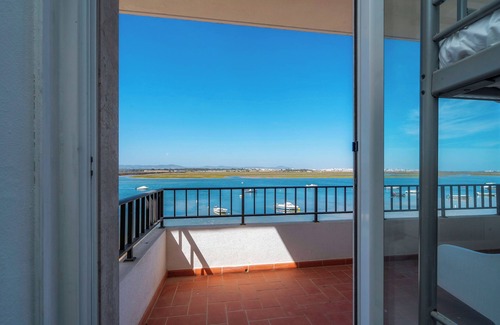 Praia de Faro Casa | Casa de playa en Sundance / Casa da Ilha