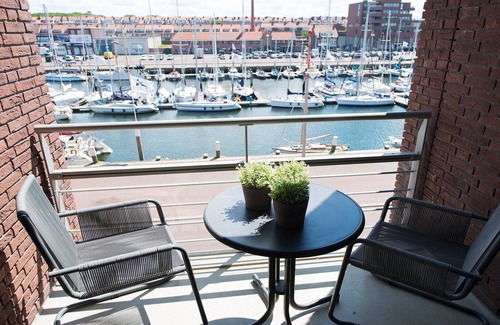 Vissershaven Apartamento | Retiro soleado con balcón