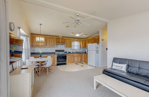 Assateague Pointe Casa | Sunny coastal home with private patio, on-site pool, central AC, & W/D
