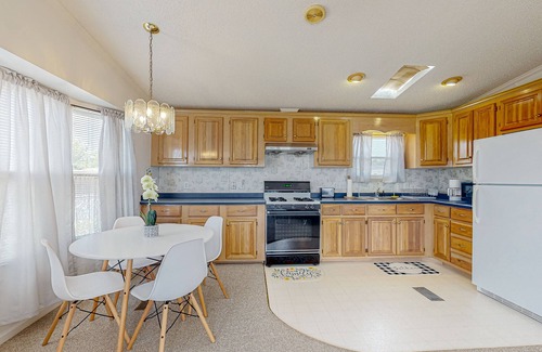 Assateague Pointe Casa | Sunny coastal home with private patio, on-site pool, central AC, & W/D