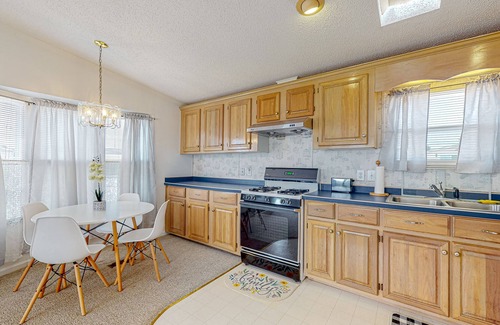 Assateague Pointe Casa | Sunny coastal home with private patio, on-site pool, central AC, & W/D