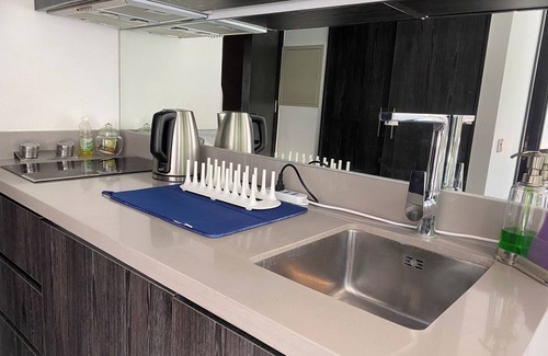 Downtown Santiago Apartamento | Sunny Studio in the Center of Santiago: Your Cozy City Escape.