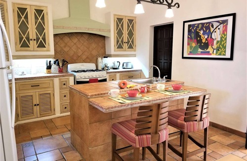 Costa Casa | Sunny, warm two-story colonial home located just one block from parque Santa Lucia,