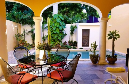 Costa Casa | Sunny, warm two-story colonial home located just one block from parque Santa Lucia,