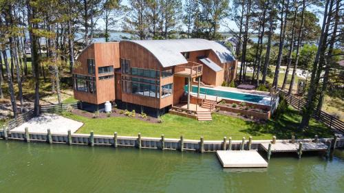 Deep Hole Casa | Sunrise Shore - Waterfront with private pool & hot tub!