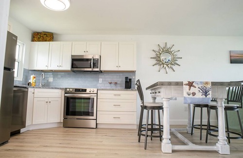 Boca Grande Condominio | Boca Grande Waterfront Condo overlooking Marina & Stunning Sunrises~Pool, WiFi