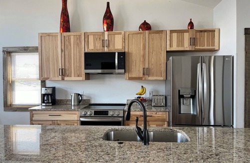 New Lisbon Casa | Sunset Lake Paradise new 4-bedroom lake house with private beach, WiFi, and AC