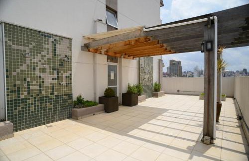 Bras Apartamento | Sunset One - No Brás com varanda e estacionamento incluso
