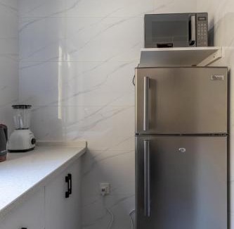 Kilimani Apartamento | Sunset Skyline Alba by YourHost1 bedroom Nairobi