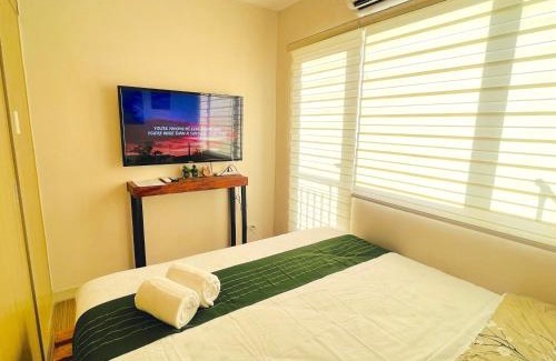 Ususan Apartamento | Sunset View w/King BednWI-FI at Grace Res, Taguig