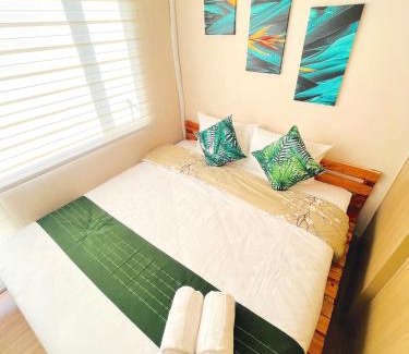 Ususan Apartamento | Sunset View w/King BednWI-FI at Grace Res, Taguig