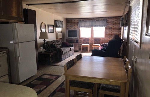 Stoddard Casa | Sunset Waters: Serene Retreat on the Mississippi River Shoreline Fisher Friendly