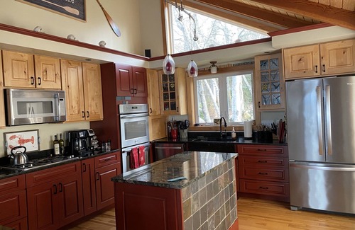 Standish Casa | Sunsets over Sebago Lake