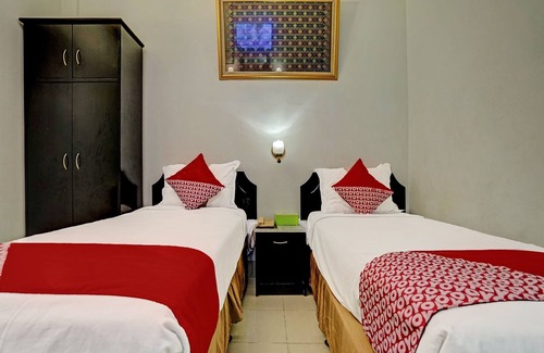 Palembang Hotel | Super OYO 91805 Hotel Wisma Bari