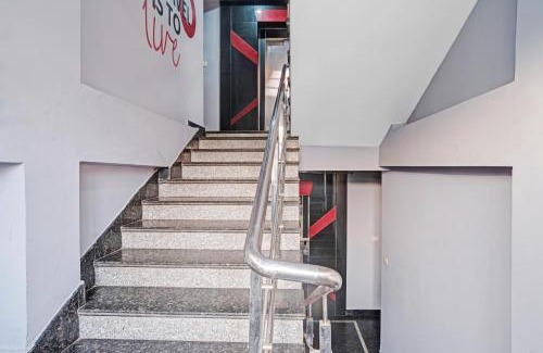 Sualkuchi Hotel | Super Townhouse Zoo Road Near Guwahati Central formerly IR Luxuria