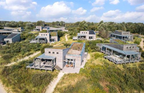 Ouddorp Villa | Super VIP Waterfront Villa - 4p Direct bij het Strand & Waterzicht - Villa 41
