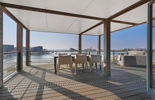 Ouddorp Villa | Super VIP Waterfront Villa - 4p Direct bij het Strand & Waterzicht - Villa 41