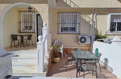Puerto Marino Casa | Magnífica casa adosada - espaciosa, con orientación sur a la piscina y jardines, con wifi / aire acondicionado.