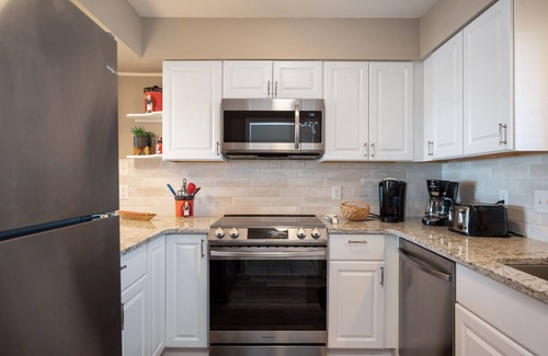 Caswell Beach Condominio | Swept Away: Modern Oceanfront Condo Steps from Community Pool