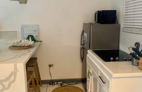 Orange Bay Apartamento | Point Village Beach, Sand, Sleep, Exhale (seguridad las 24 horas + Wifi gratuito y cable)